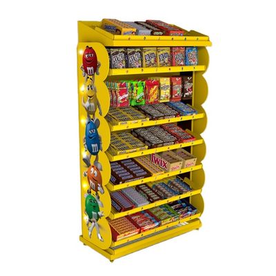Los puntos de venta del caramelo exhiben el estante de exhibición del bocado de la tienda con las bandejas desprendibles del metal