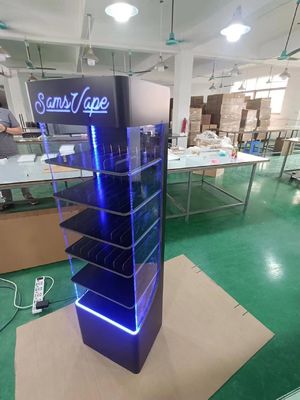 Venta en caliente de suelo montado Acrylic Display Rack LED Display Stand para productos de E